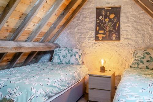 a bedroom with a twin bed and a night stand at 2 Bed in Clevedon oc-t30786 in Clevedon
