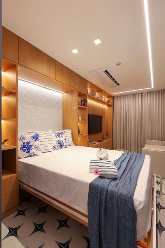 a bedroom with a large bed in a room at Luxury Flat with Breakfast! in Ipojuca
