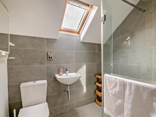 a bathroom with a toilet and a sink at 2 Bed in Helmsley oc-g0037 in Helmsley