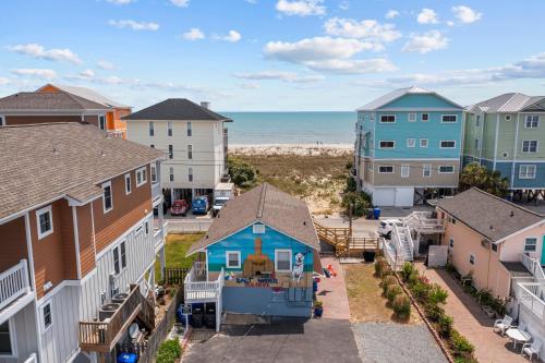 an aerial view of a town with houses and the beach at Vitamin Sea Suites 4 in Carolina Beach