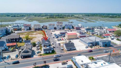 an aerial view of a small town next to a river at The Anchorage Cape May in Cape May