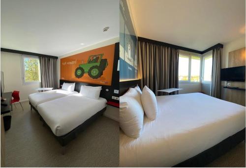 a hotel room with two beds and a tractor painting on the wall at ibis Styles Flers in Flers