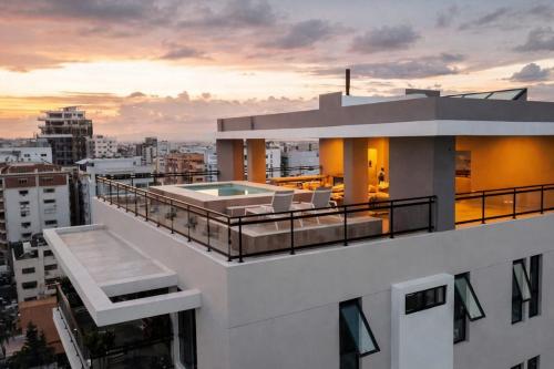 Modern apartment with pool and rooftop, centrally located