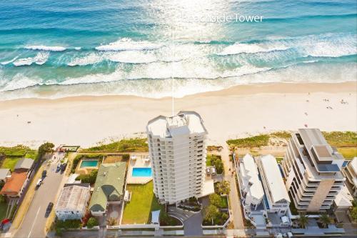 an aerial view of the beach and the ocean at Absolute Beachfront Ocean Balcony Heated Pool in Gold Coast