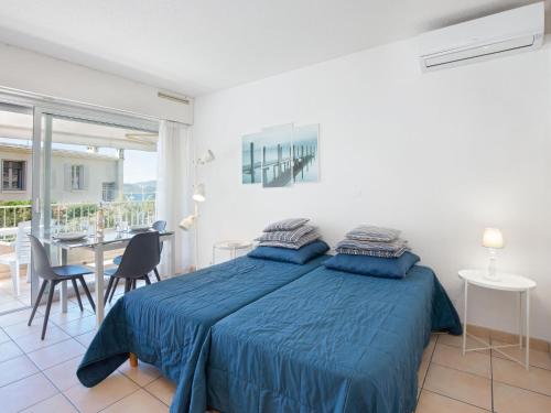Studio Climatisé Proche Plage et Commerces avec Balcon, Wi-Fi et Parking
