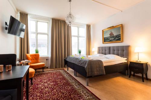 Postel nebo postele na pokoji v ubytování Hotell Drottninggatan 11
