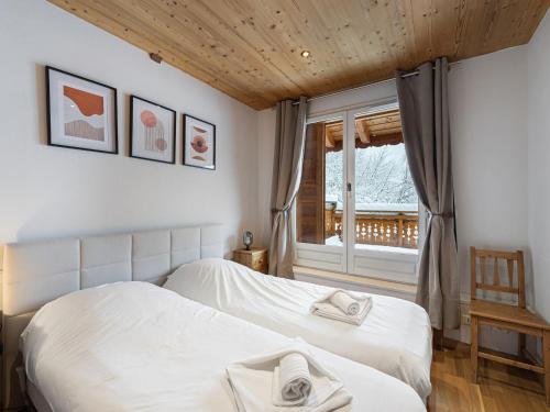 Chalet en duplex exposé sud avec cheminée à Méribel