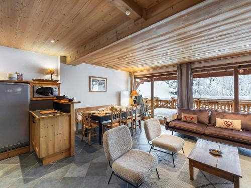 Chalet en duplex exposé sud avec cheminée à Méribel