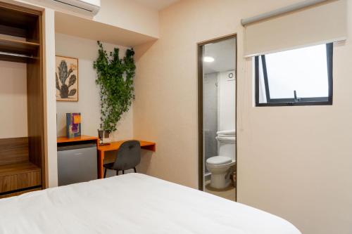 Llit o llits en una habitació de Atrio Polanco