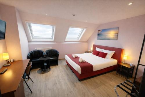 Llit o llits en una habitació de Hotel Cardiff