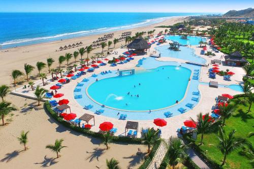 an aerial view of a resort pool and the beach at Royal Decameron Punta Sal - ALL INCLUSIVE in Canoas de Punta Sal