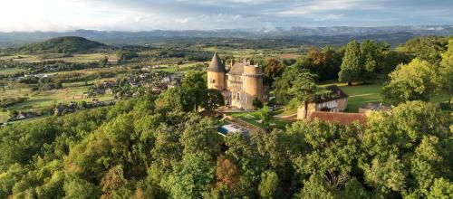 an aerial view of a castle on a hill at Château Blanat in Saint-Michel-de-Bannières