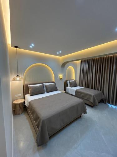 Ionian View B&B tesisinde bir odada yatak veya yataklar