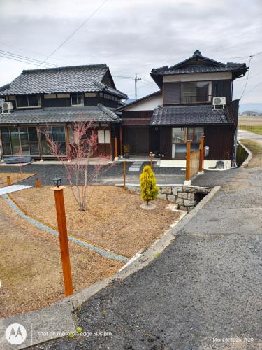 a building with a house with at Smith 夫婦 in Setouchi