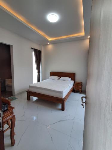 a bedroom with a bed in a room at Villa Luck Canggu Bali unit 7 in Canggu