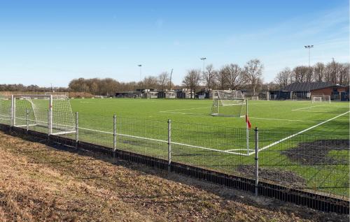 a soccer field with a soccer net on it at 2 Bedroom Nice Apartment In Vejen in Vejen