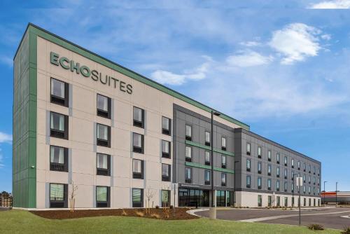 a large building with the words esbit industries on it at ECHO Suites Extended Stay by Wyndham Colorado Springs Airport in Colorado Springs