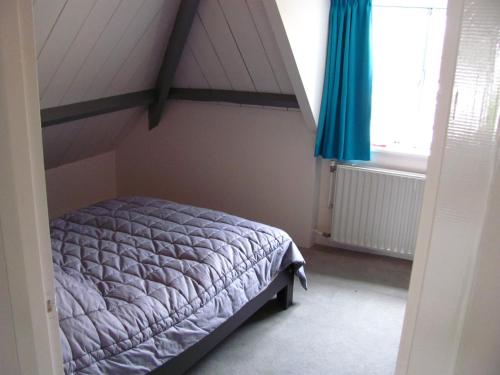 เตียงในห้องที่ Sonnehûs