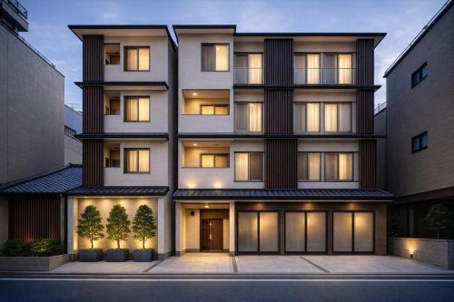 an image of a building with lights on at INA HOUSE Nijojo in Kyoto