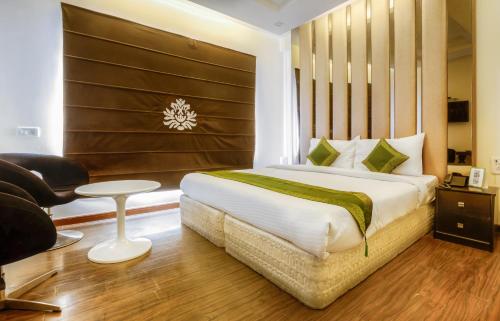 Postel nebo postele na pokoji v ubytování Hotel Gold Souk - Karol Bagh