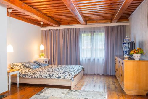 Posteľ alebo postele v izbe v ubytovaní Apartament Fajansowy