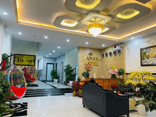 a lobby with a store with flowers and plants at Hanah Hotel Phan Thiet in Phan Thiet