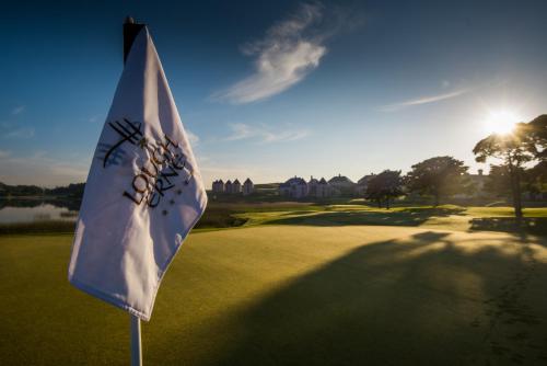 a flag in front of a golf course at Lough Erne Resort in Enniskillen