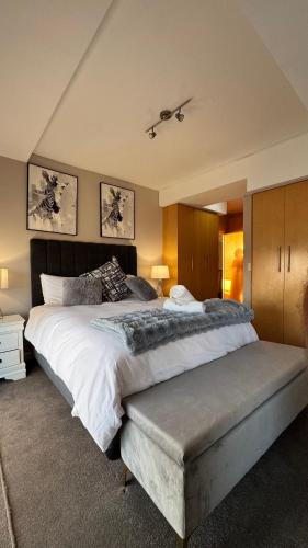 a large bedroom with a large bed and aomnia at Hibernian Towers 1503 in Strand