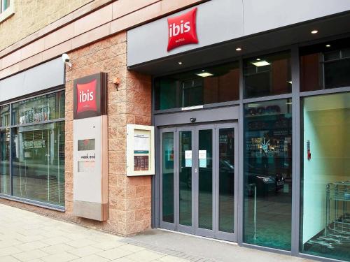 a store front of a ups store with glass doors at ibis Carlisle City Centre in Carlisle