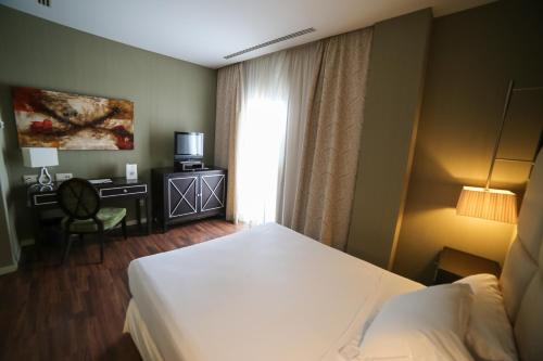 Una cama o camas en una habitación de Hotel 525