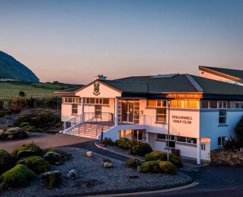 a rendering of a building with a hill in the background at Surfers Getaway - Room Staycation in Sligo