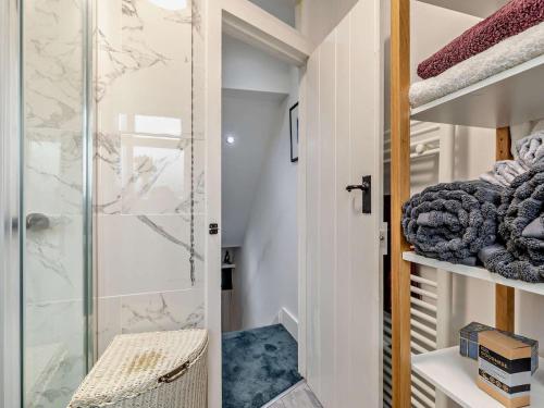 a bathroom with a walk in shower and a glass door at 2 Bed in High Peak oc-94131 in Buxworth