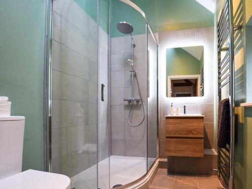 a bathroom with a shower and a toilet and a sink at 2 Bed in Evesham oc-89305 in Church Lench