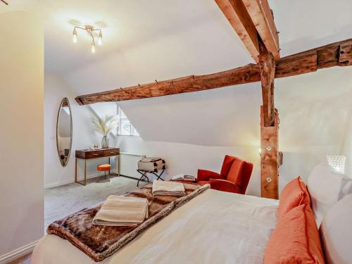 a bedroom with a large bed and a desk at 2 Bed in Warwick oc-93085 in Warwick
