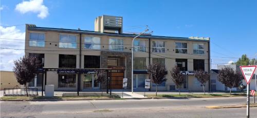 a building on the corner of a street at Portales del Vino 2 in Tupungato