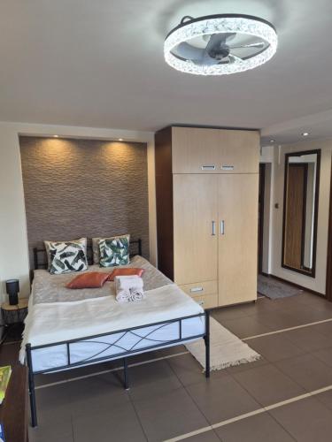 a bedroom with a large bed in a room at City View Studio Chmielna in Warsaw