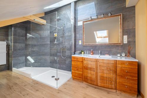 a bathroom with a shower and a sink at Cosy Loft in Nantes in Nantes
