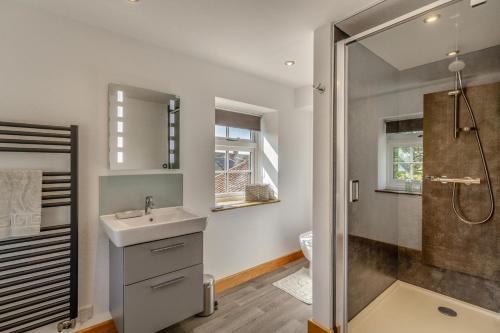 a bathroom with a sink and a shower at 2 Bed in Pickering oc-t29975 in Middleton