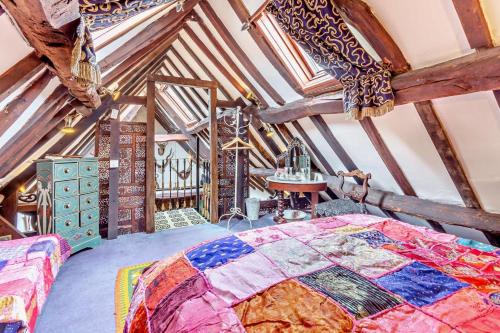 a bedroom with a large bed in a attic at 1 Bed in Long Bennington oc-t29871 in Long Bennington