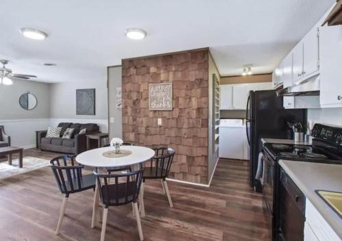 a kitchen and living room with a table and chairs at Pawnee Duplex in Chattanooga Unit 1 in Chattanooga