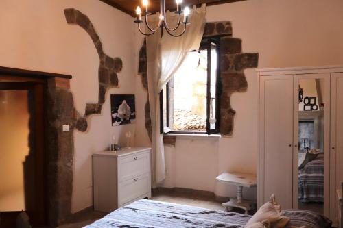 a bathroom with a sink and a window at Casa Margherita in Bolsena