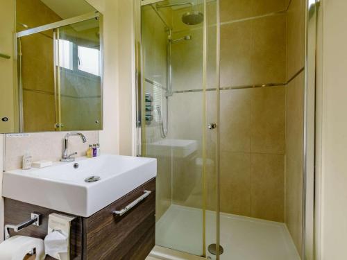 a bathroom with a sink and a shower at 2 Bed in Newark oc-88427 in Walesby