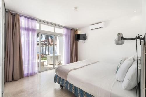 Ruby Villa with Rooftop by Signature Stays Aruba, Bãi biển Palm-Eagle ...