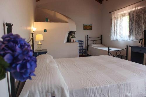 Postel nebo postele na pokoji v ubytování Agriturismo Galea