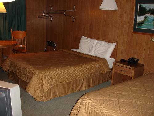 Ein Bett oder Betten in einem Zimmer der Unterkunft Georgetown Mountain Inn