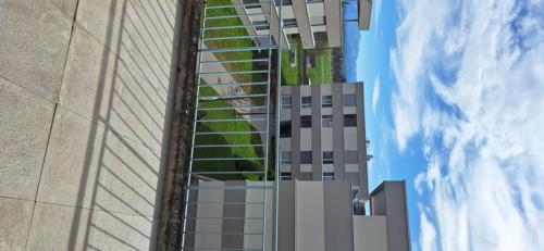 a rendering of a building with a green facade at Gasthof Moosmatt in Egolzwil