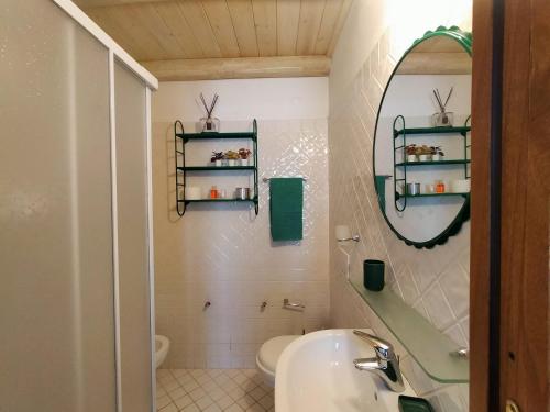 a bathroom with a sink and a mirror at Seaside Home - Palau in Palau
