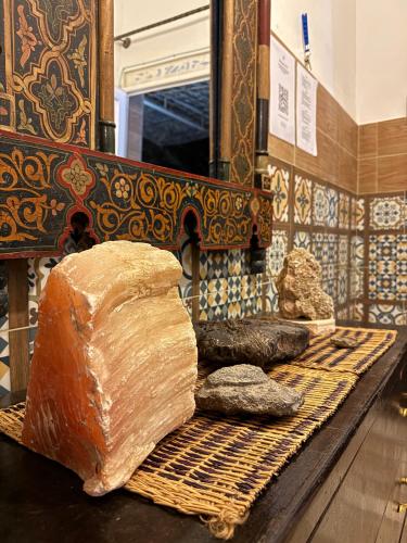 a display of bread on a table in a store at Villa Palm Desert- your Private Stay with AC, Fast WiFi & Parking in Erfoud