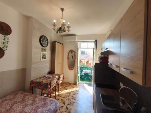 a bedroom with a table and a dining room at Hypercentre Nice Jean Medecin in Nice