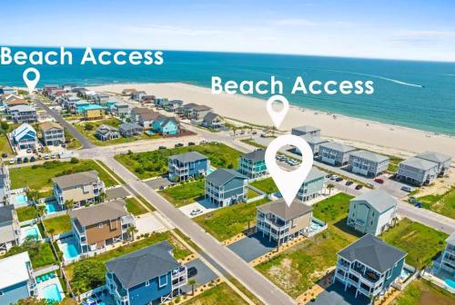 an aerial view of beach access and beach houses at East End Views in Ocean Isle Beach